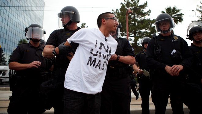 Arizona police and protesters.jpg